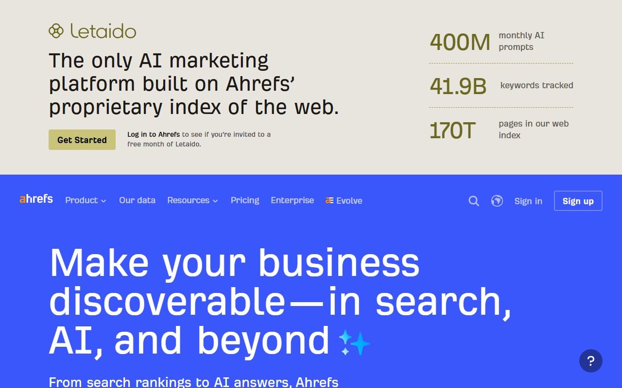 Screenshot of ahrefs.com: a cream banner for Letaido on top, with a Get Started button and three index statistics, and below it the blue Ahrefs navigation and the hero headline “Make your business discoverable—in search, AI, and beyond”.